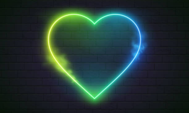 istock Neon heart. Bright night neon signboard on brick wall background with backlight. Retro glow neon heart sign. Romantic design for Happy Valentines Day. Night light advertising. Concept: valentine's day, anniversary, mother's day, marriage, invitation e-car 1545413276