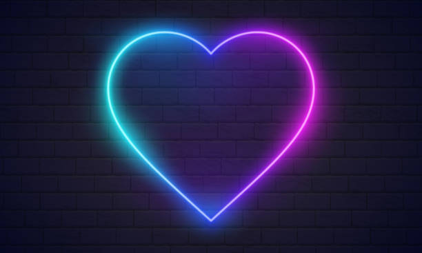 istock Neon heart. Bright night neon signboard on brick wall background with backlight. Retro glow neon heart sign. Romantic design for Happy Valentines Day. Night light advertising. Concept: valentine's day, anniversary, mother's day, marriage, invitation e-car 1545414362
