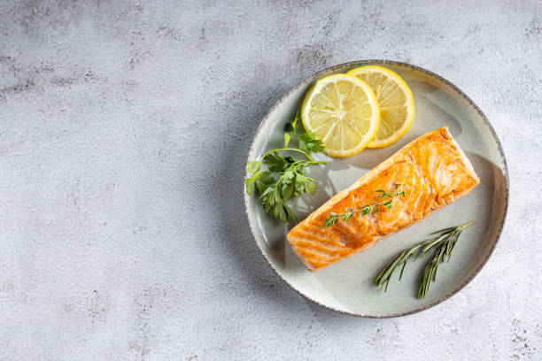 istock Grilled salmon with spices on the plate. 1545417615