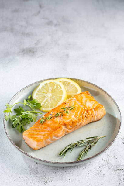 istock Grilled salmon with spices on the plate. 1545418198