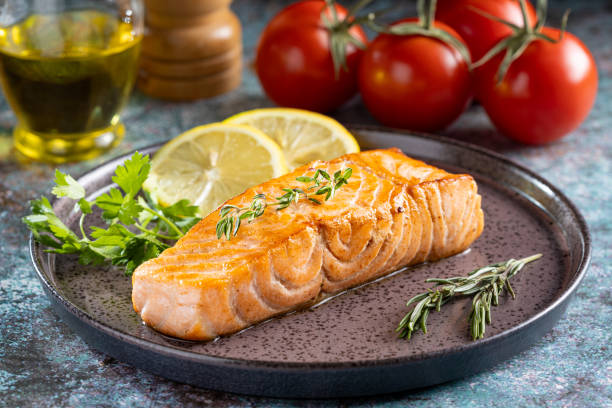 istock Grilled salmon with spices on the plate. 1545420317