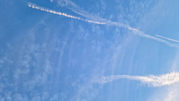 istock View of light clouds and aircraft trails 1545428874