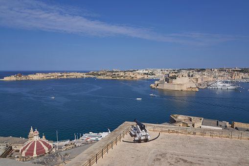 Valetta, Malta - June 8, 2023: View across the Grand Harbour from Upper Barrakka Gardens to Birgu and Senglea in Malta