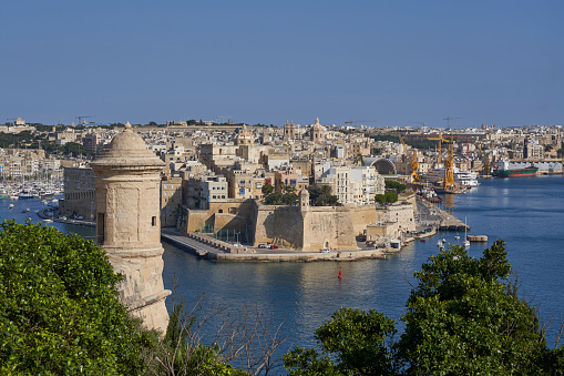Valetta, Malta - June 8, 2023: Scenic view from the city of Valetta across the Grand Harbour to Birgu and Senglea