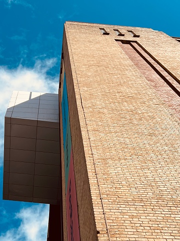 Low angle view of a tall brick building