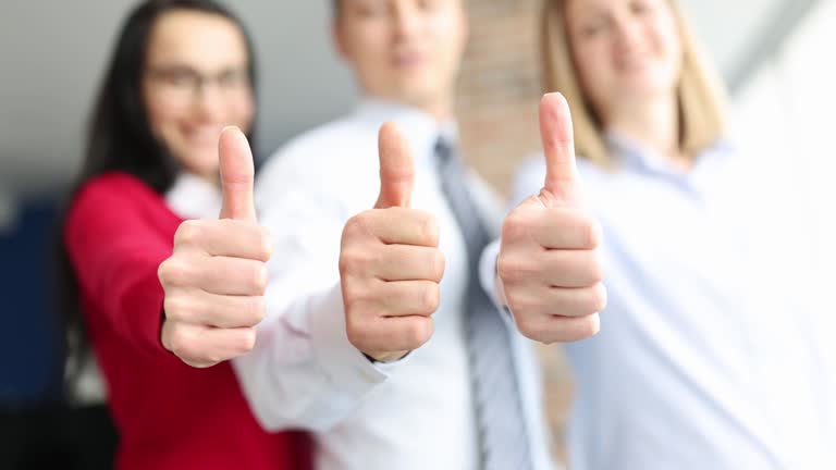 Group of young business people showing thumb up 4k movie