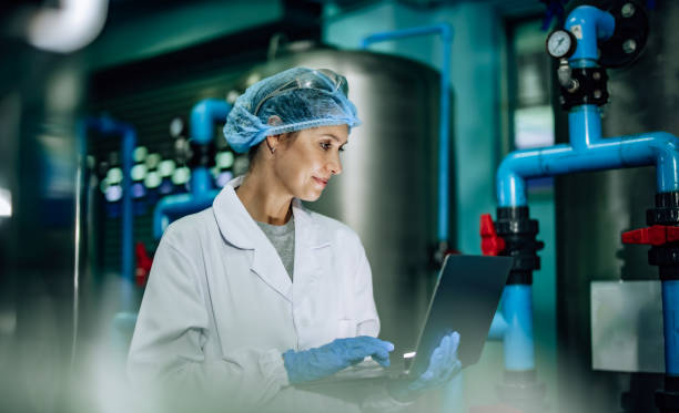 istock Water Quality Officer assesses RO systems, ensuring standards, safety and control the contamination 1545464759