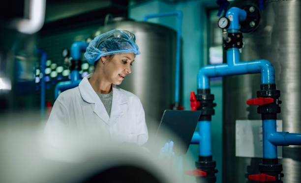 istock Water Quality Officer assesses RO systems, ensuring standards, safety and control the contamination 1545464760