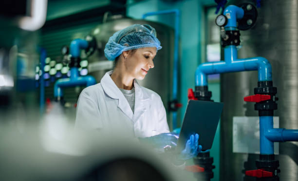 istock Water Quality Officer assesses RO systems, ensuring standards, safety and control the contamination 1545464762