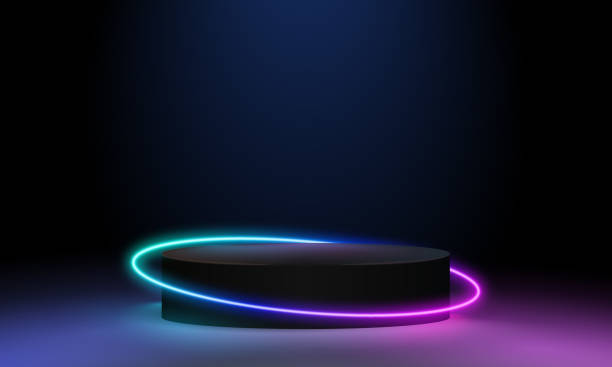 istock Abstract cosmic vibrant color podium backdrop. Glowing neon lighting on dark background with copy space. Top view futuristic style. Neon podium with gradient neon frames 1545512289