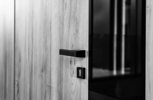 istock Wooden door with glass reflection background. 1545512813