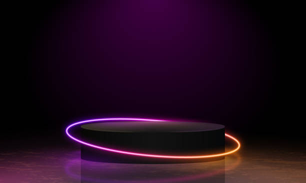 istock Abstract cosmic vibrant color podium backdrop. Glowing neon lighting on dark background with copy space. Top view futuristic style. Neon podium with gradient neon frames 1545512837