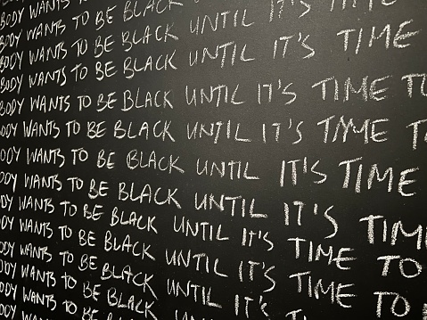 Political slogans on a blackboard