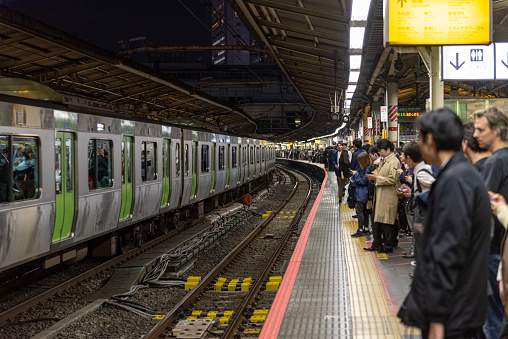 Tokyo, Japan - October 30, 2019: Crowded Train Station in Japan, Tokyo. People are Waiting for the Train.