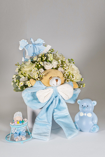 Bouquet for newborn baby girl or boy. Flowers composition, gift for kids