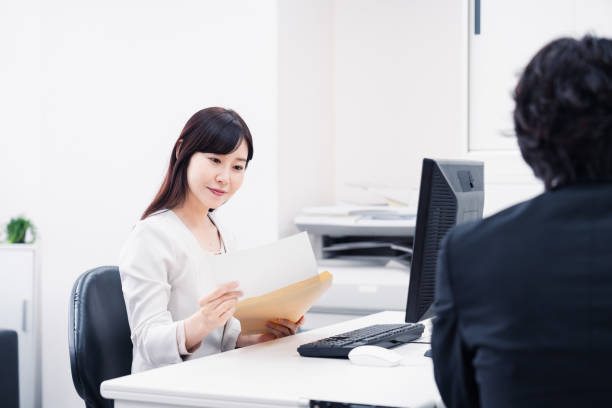 istock Female employee doing clerical work in the office 1545587500