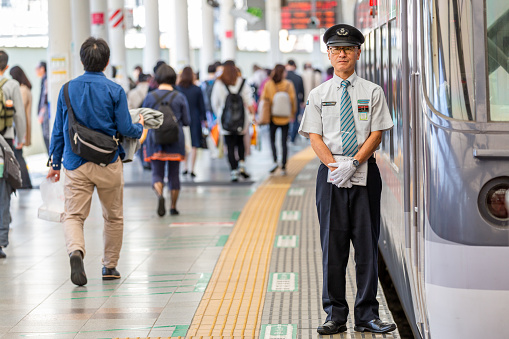 Tokyo, Japan - October 30, 2019: Seibu Shinjuku Railway station in Shinjuku, Tokyo, Japan, Train Driver is waiting to depart. Portrait.
