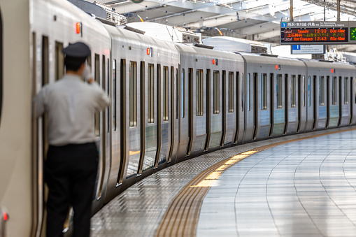 Tokyo, Japan - October 30, 2019: Seibu Shinjuku Railway station in Shinjuku, Tokyo, Japan, operated by the private railway operator Seibu Railway. Train Driver Is Waiting for the departure