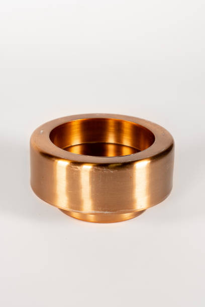 istock Antique brass candle holder for pillar candle. Isolated over white. 1545637808