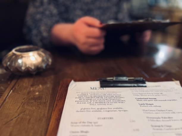 A food menu on a restaurant table