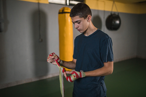 Boxing Cloth. Use Strong Kickboxer Wraps His Hands In A Cloth Before Putting On Boxing ...