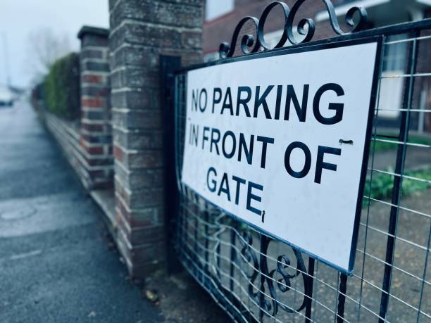 istock No Parking In Front Of The Gate signage 1545665673