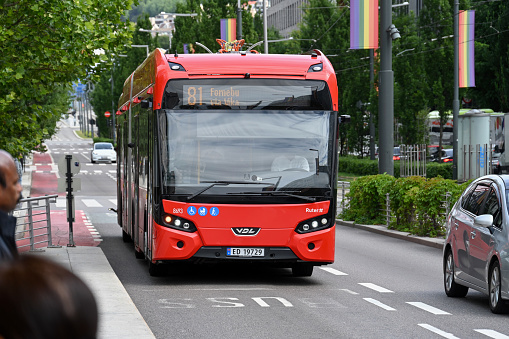 Oslo, Norway, July 4, 2023 - Line 81 city bus in downtown Oslo on a cloudy summer day.