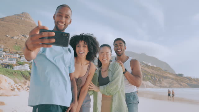 Couple of friends, beach and happy selfie together on vacation or holiday in summer. Diversity men and women group with peace hand sign for crazy travel adventure for social media in South Africa