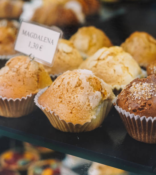 istock Different cakes and cupcakes in a pastry shop 1545718094