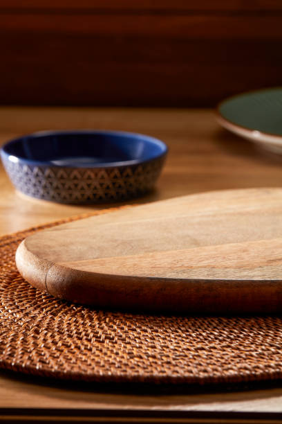 istock Wooden board for serving vegetables in Chinese traditional table setting 1545719658