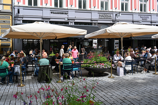 Oslo, Norway, July 3, 2023 - Street café Brødrene Bergh, Victoria - Nasjonal jazzscene in the main street / boulevard Karl Johan (Karl Johans Gate) in downtown Oslo