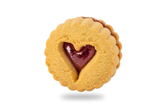 Linzer cookie with strawberry jam, Traditional Austrian butter biscuit on Valentines Day. Isolated on white with clipping path included