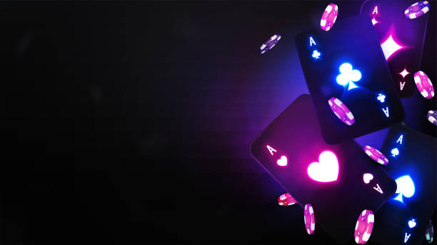 istock Blackjack black neon poker card with poker chips on black blurred background. Casino backdrop for your arts 1545800390