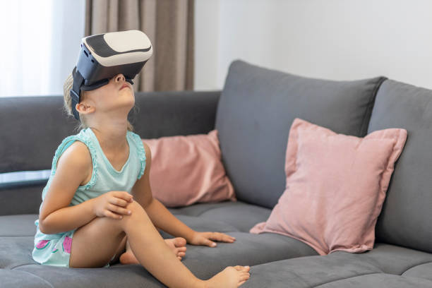 istock Girl with the virtual glasses 1545802305