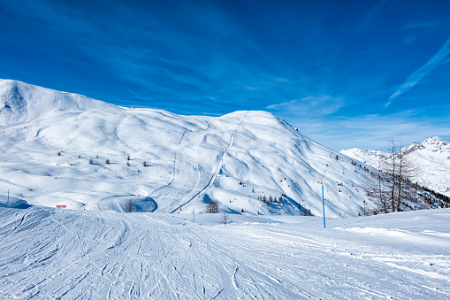 Skiers on top at winter ski resort Hintertux, Tirol, Austria.