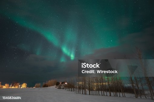 istock aurora borealis in the night sky above Reykjavik, Iceland, with stars twinkling in the background 1545826684