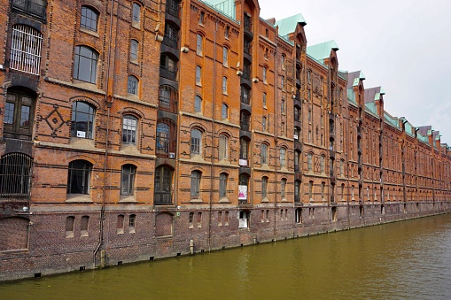 The Speicherstadt, literally: 'City of Warehouses', meaning warehouse district) in Hamburg, Germany, is the largest warehouse district in the world where the buildings stand on timber-pile foundations, oak logs, in this particular case.