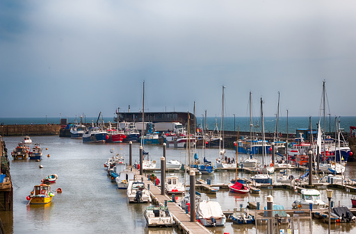 Bridlington, United Kingdom - May 14 2022: Harbour in Bridlington, a coastal town and a civil parish on the North Sea in the East Riding of Yorkshire, England. HDR.