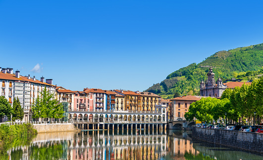 Tolosa skyline in sunny day by the river Oria in Gipuzkoa, Guipuzcoa at Basque Country of Spain, Euskadi