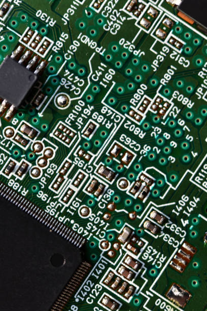 istock Blue board with radio elements. A chip with a processor and transistors. Diodes and resistors. Microchip. 1545975942