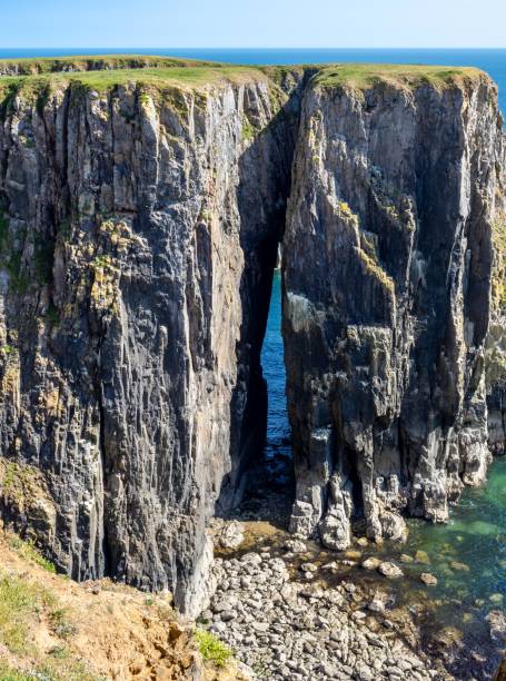 istock Huntsman's Leap natural arch, Wales 1546006157