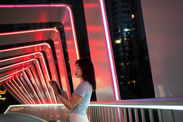 istock Female businessmen at night using virtual reality technology 1546035956