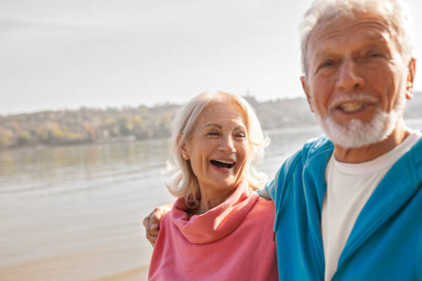 istock Senior couple walking having fun 1546043158