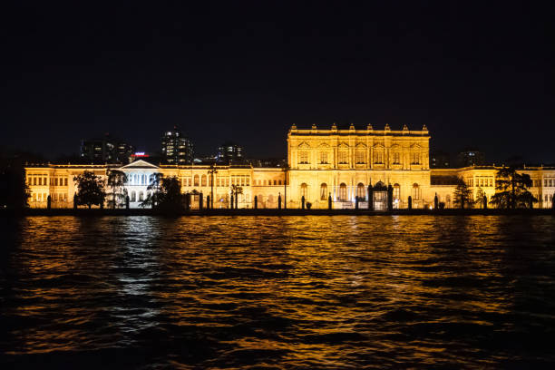 Istanbul, Turkey- january 31, 2022: Dolmabahce Palace at night, view from water