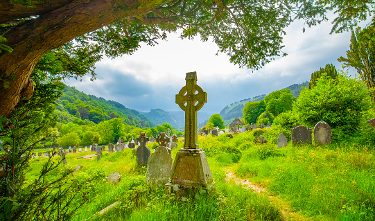 Old Irish celtic cemetery in Glendalough valley, Ireland travel photo