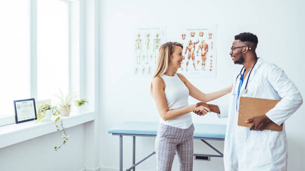 istock Female patient visiting health professional. 1546164226