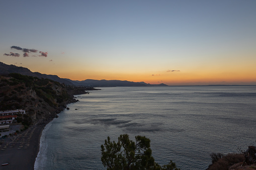 Beautiful landscape. Coast of the island of Crete - Greece area of Lerapetra Eden Rock. Beautiful sky at sunrise over the sea.