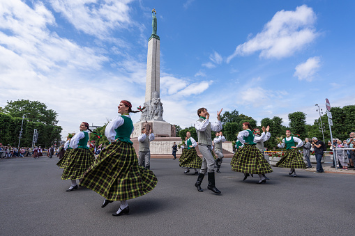 Riga, Latvia - June 2, 2023: Parade participants at the Freedom Monument