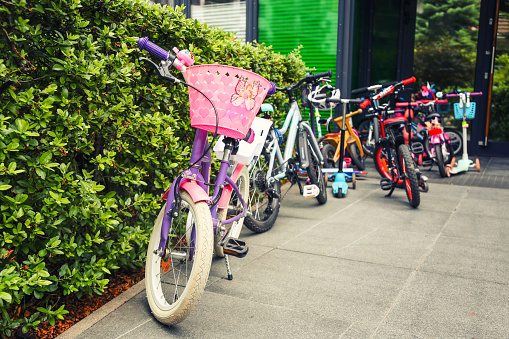parking of bicycles, scooters in front of the kindergarten doors