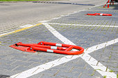 Parking barrier or fence with lock